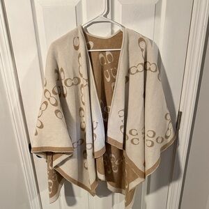 COACH REVERSIBLE SIGNATURE LOGO PONCHO 🤎